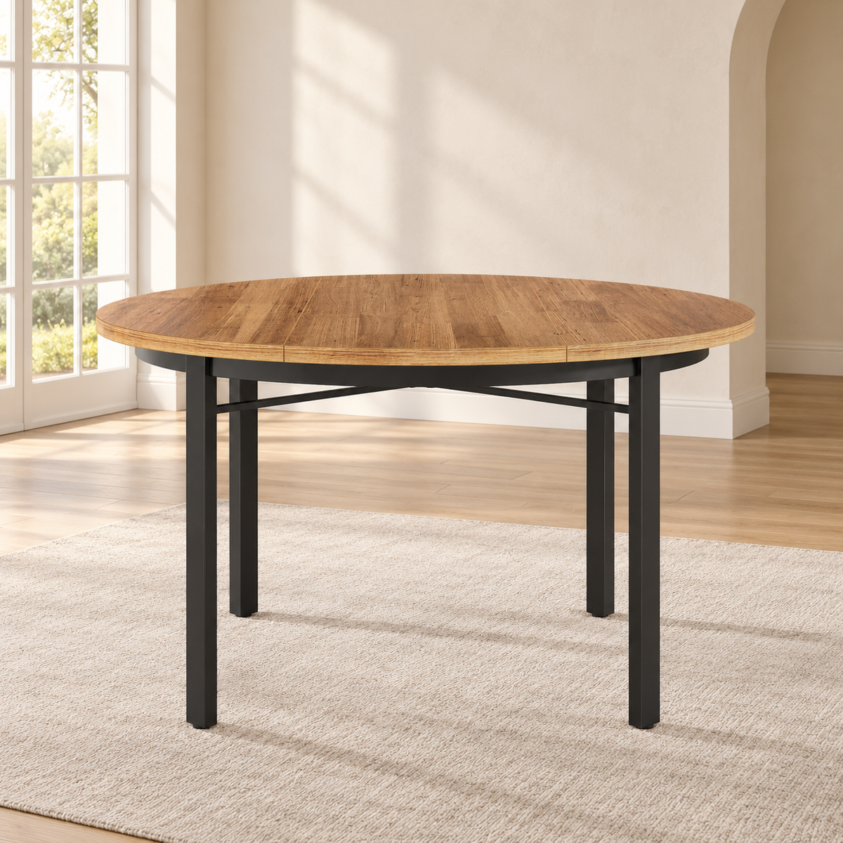 Table à manger ronde Halden XL 118 cm — plateau effet bois et piètement métal noir — produit seul dans un intérieur de maison