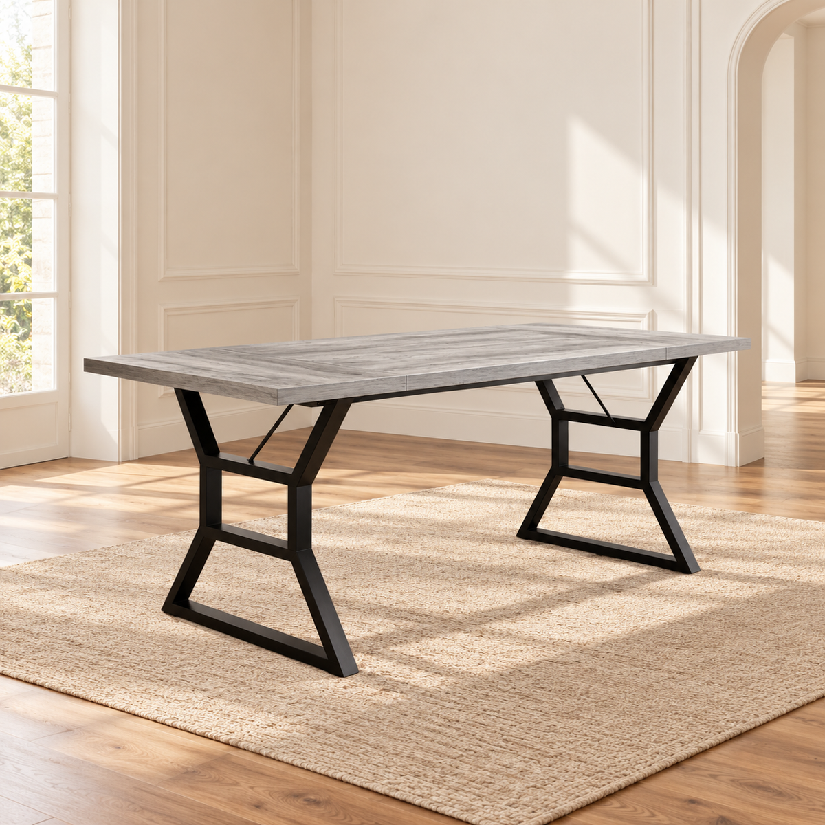 Table à manger Béton 180 cm — plateau effet béton gris et piètement métal noir géométrique — produit seul dans un intérieur de maison