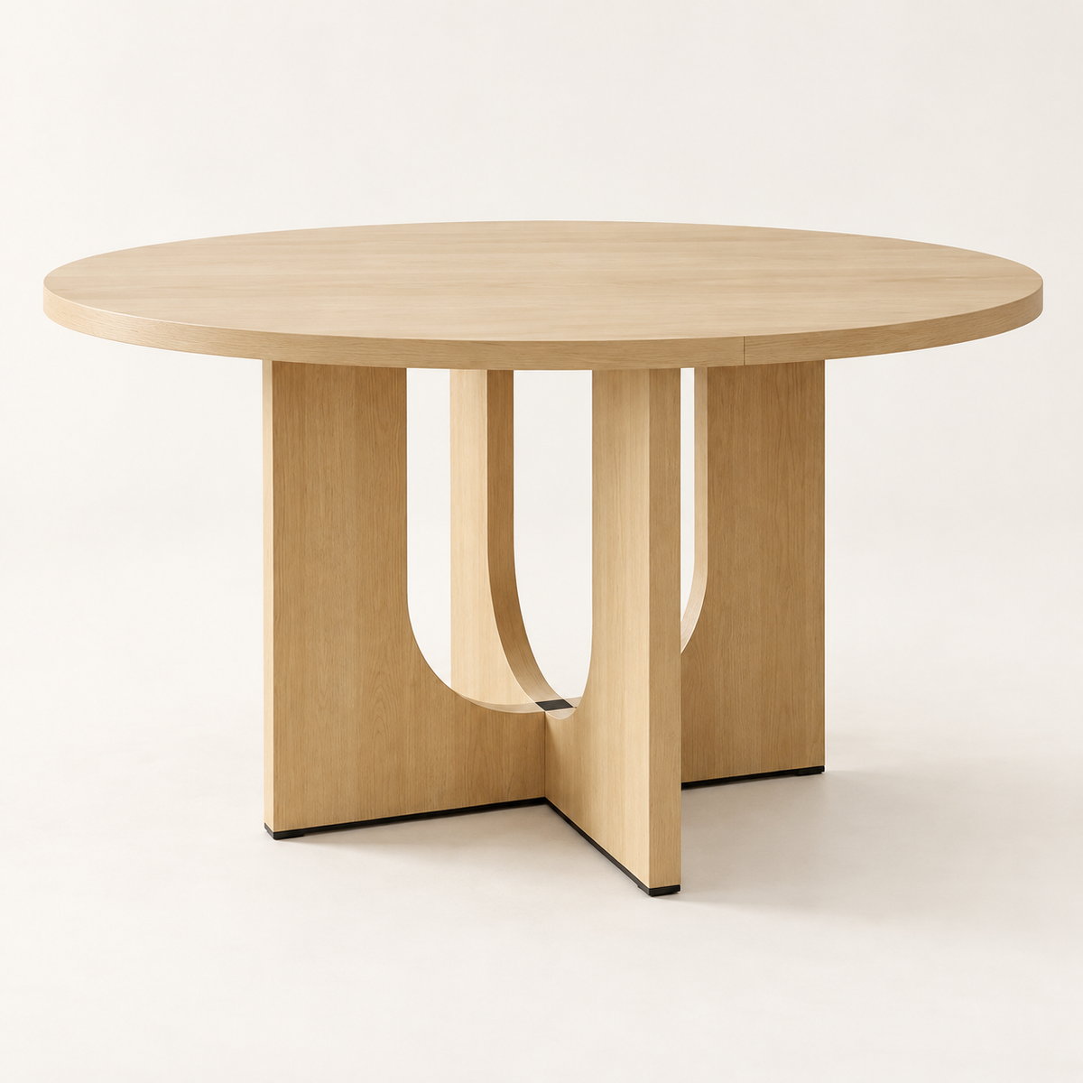 Table à manger ronde chêne clair 120 cm avec piètement à arches vue trois-quarts